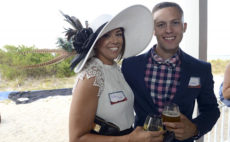 Holly Scaro and Steven Finney pose on the deck before the race.